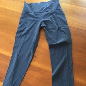 Athleta Salutation 7/8 tight in powervita; stash pocket